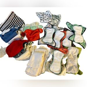 Lot of 19 cloth diapers and inserts - various brands, 3 wet bags various sizes
